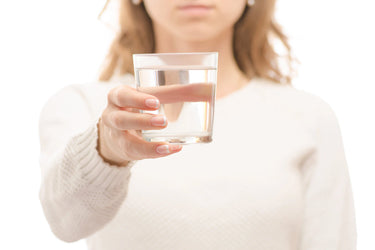 woman with cup of salt water